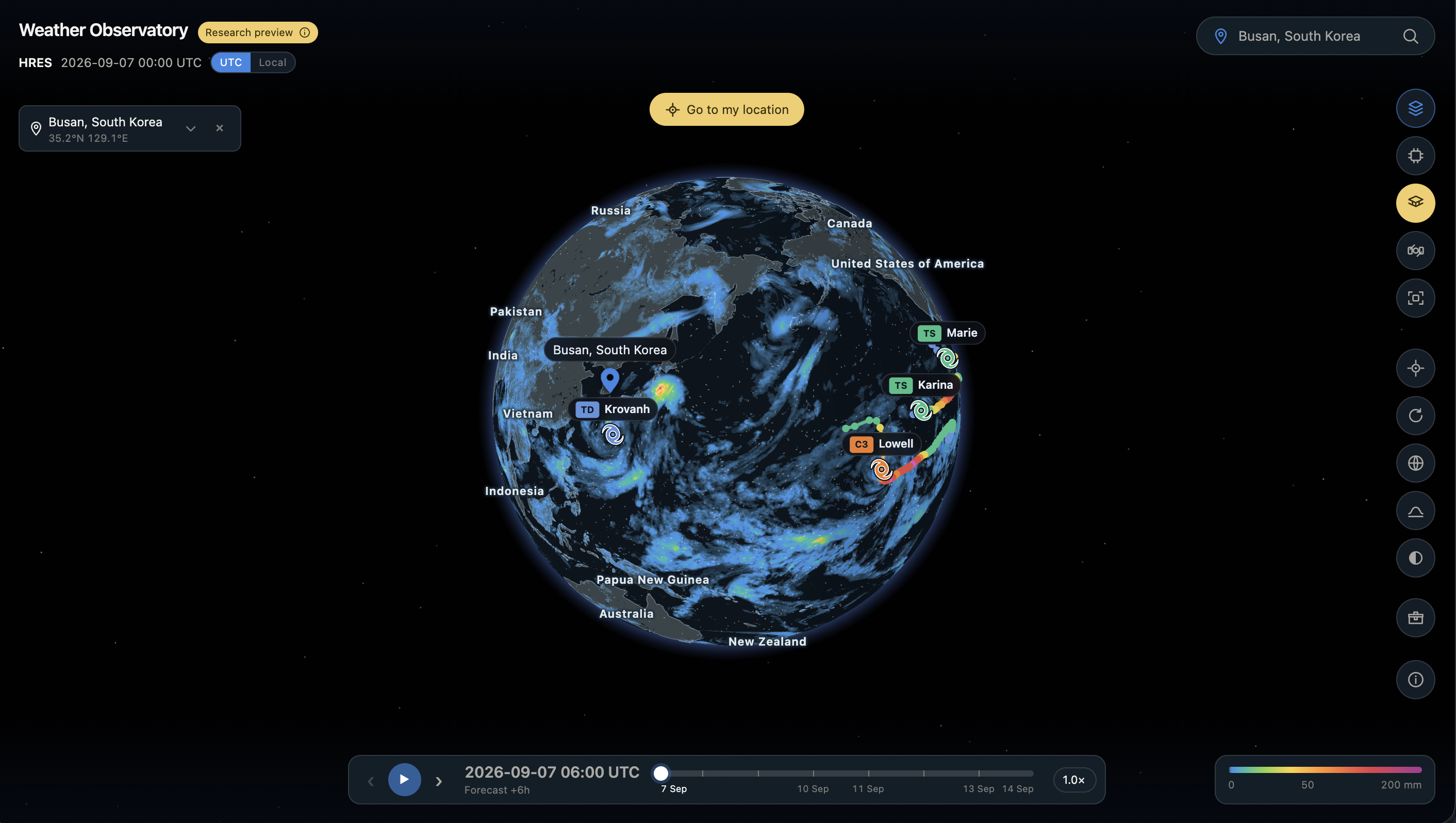 Weather Observatory interface with an interactive globe, precipitation forecasts, tropical cyclone tracks, and a forecast timeline.